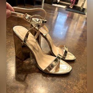 Women’s gold strapy heels